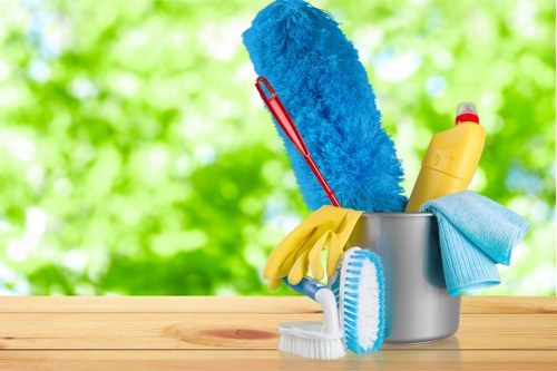 Carpet cleaning technician working safely with protective equipment